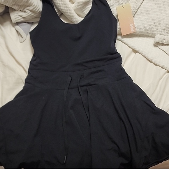 Popflex Twirl dress- black, NEVER WORN!!! I bought wrong size Iconic black dress - Picture 2 of 5